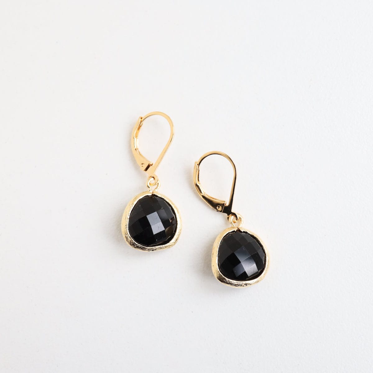 Black glass store earrings