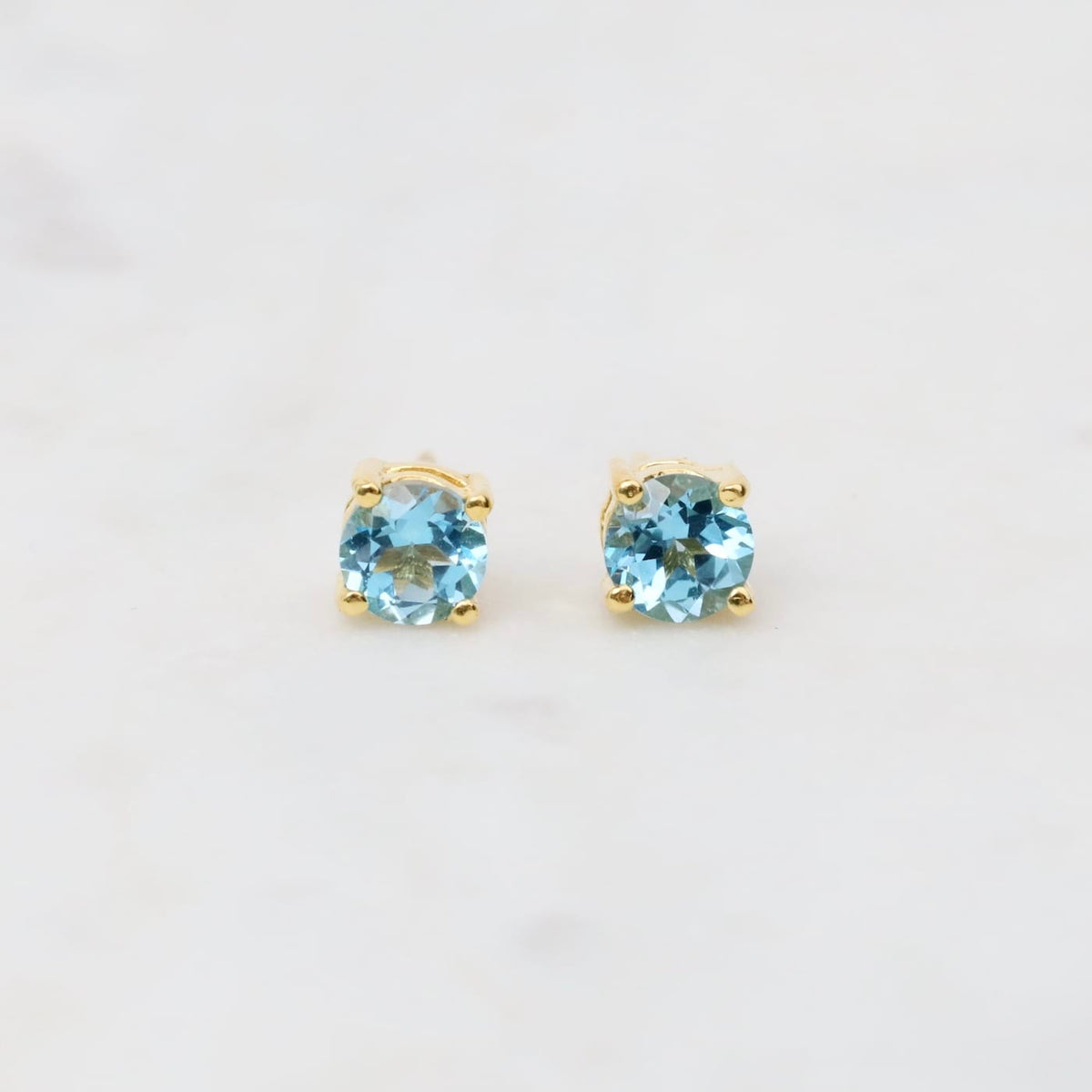 EAR-GPL Gold Plated Round Prong Set Blue Topaz Post Earrings
