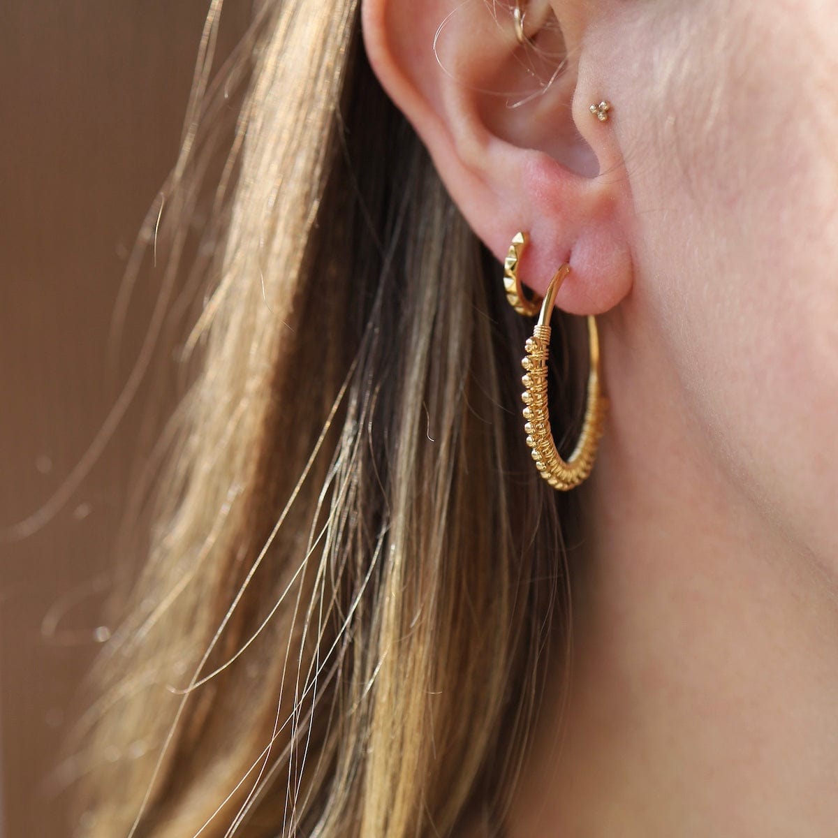 EAR-GPL Gold Plated Row of Ball Hoops