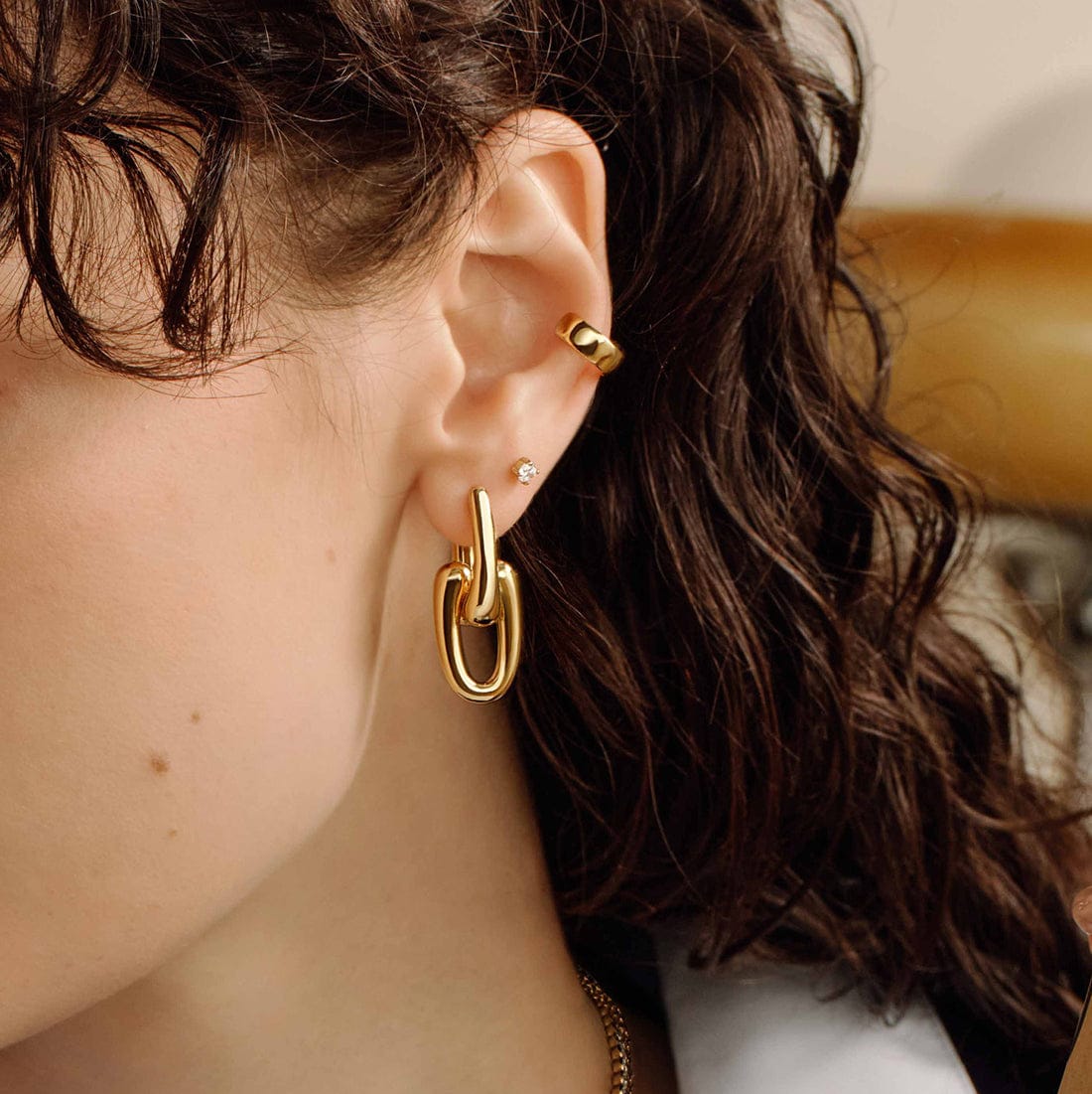 EAR-GPL Gold Sculptural Interlocking Huggie Hoop Earrings