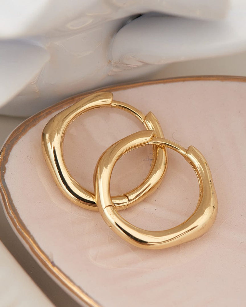 
                      
                        EAR-GPL Gold Wave Huggie Hoop Earrings
                      
                    