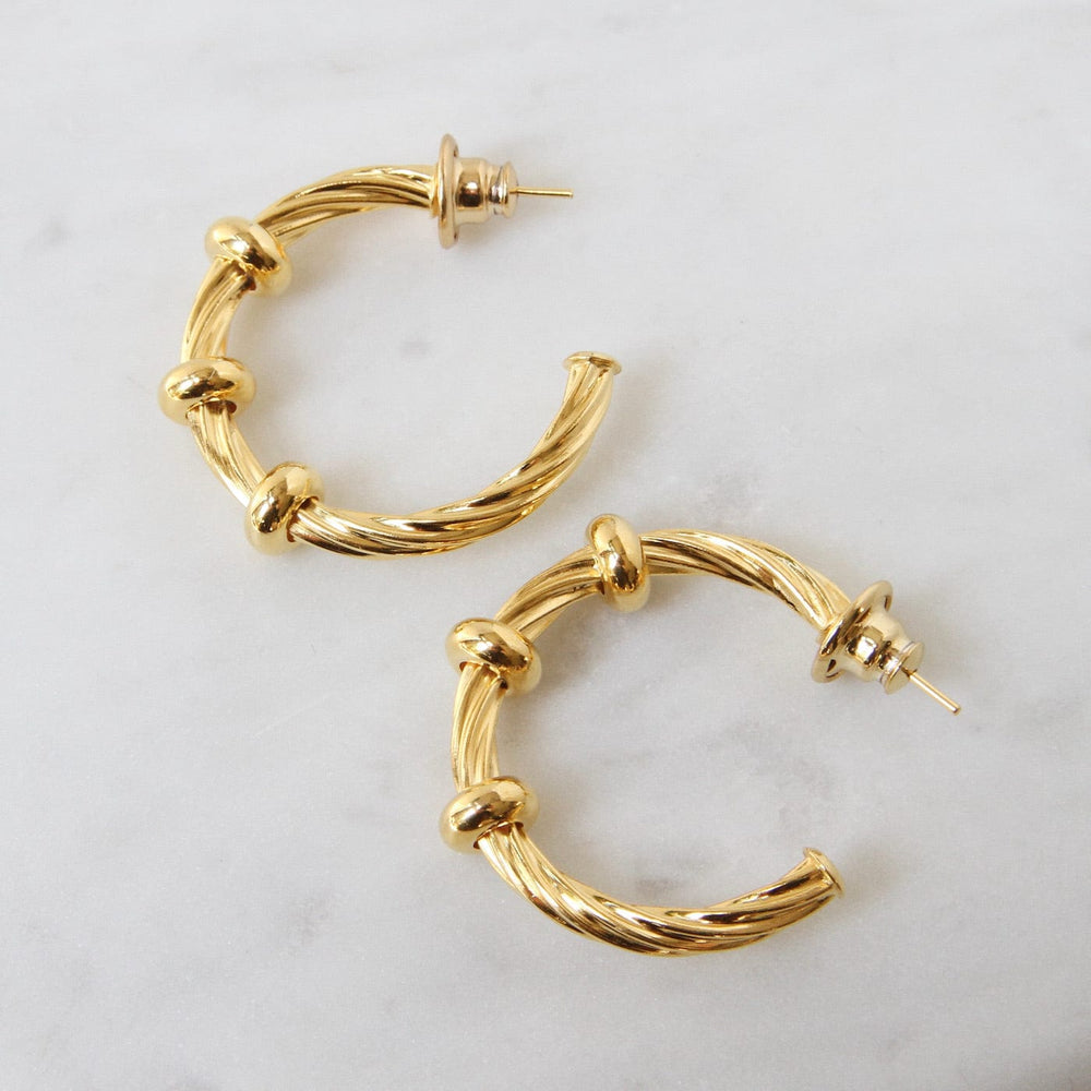 
                  
                    EAR-GPL Grazia Thin Twist Hoop
                  
                