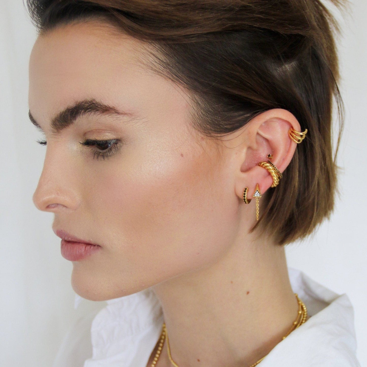EAR-GPL Huggie Earrings With Black Stones - 18k Gold Plate