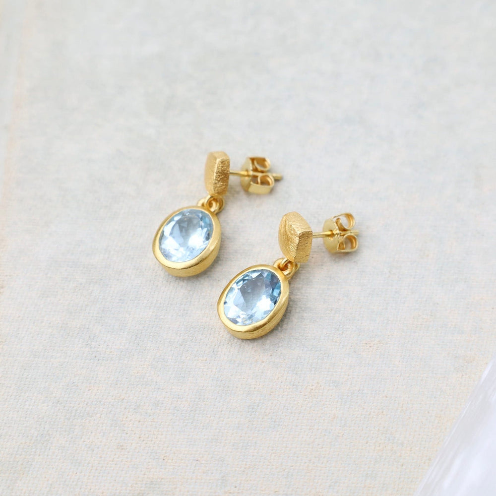 
                  
                    EAR-GPL Oval Blue Topaz Post Earrings
                  
                