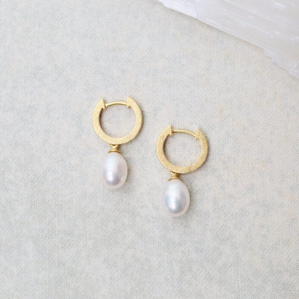 
                      
                        EAR-GPL White Pearl Huggie Earrings
                      
                    