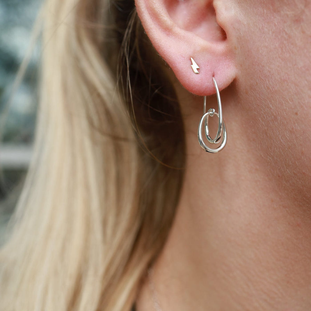 
                      
                        EAR Halo Earring
                      
                    