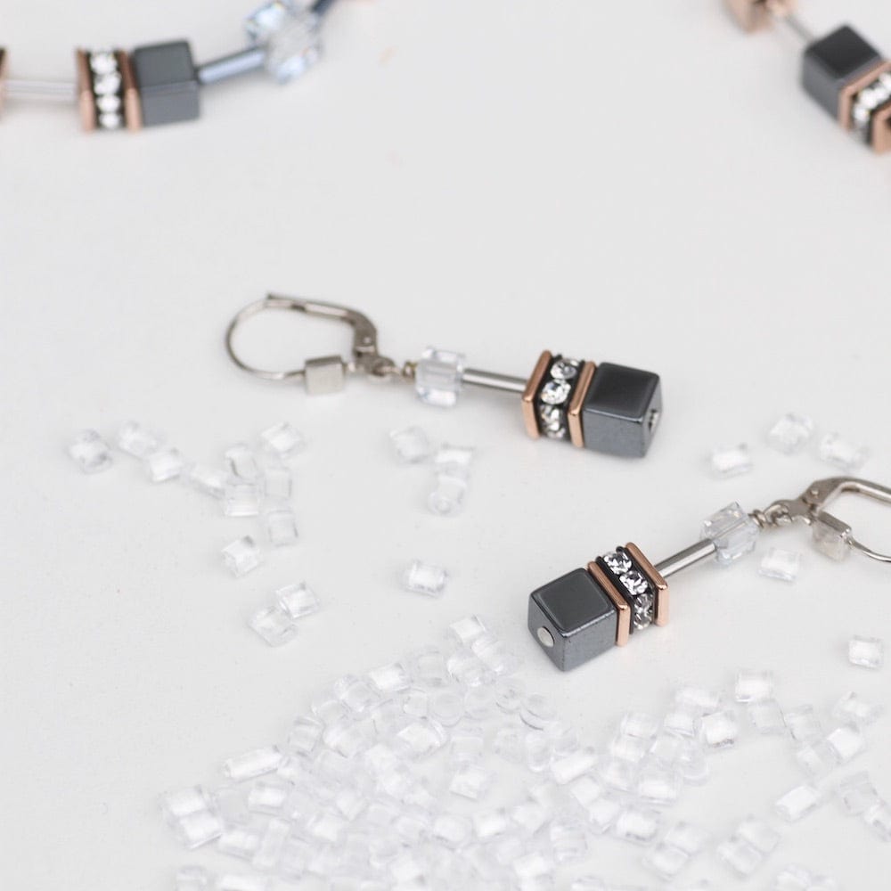 
                      
                        EAR HEMATITE GEO CUBE EARRING
                      
                    