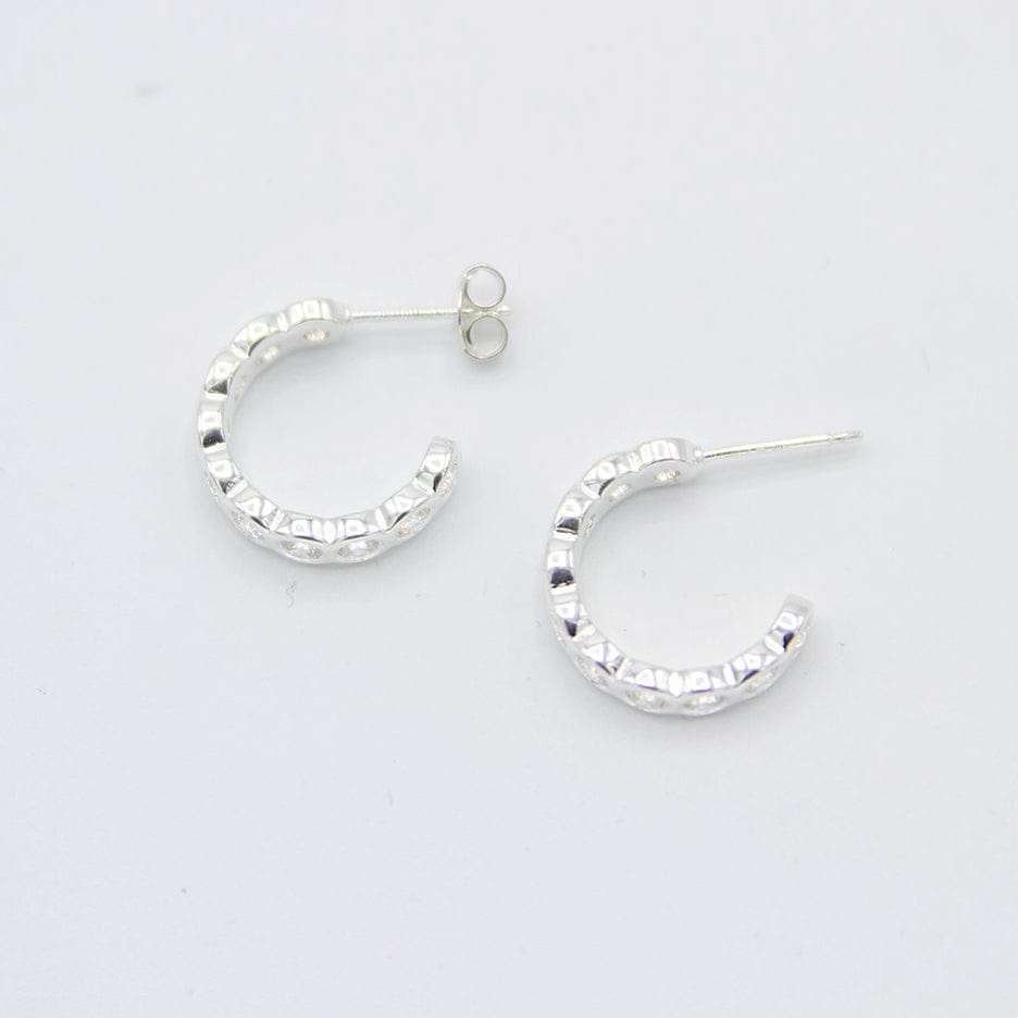 
                      
                        EAR Hoop With Continuous Bazel Set CZ's
                      
                    