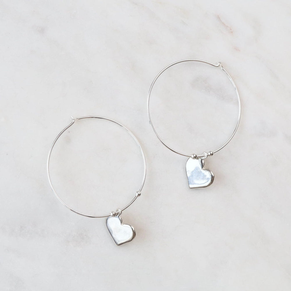 
                      
                        EAR Hoops With Heart Drop in Sterling Silver
                      
                    