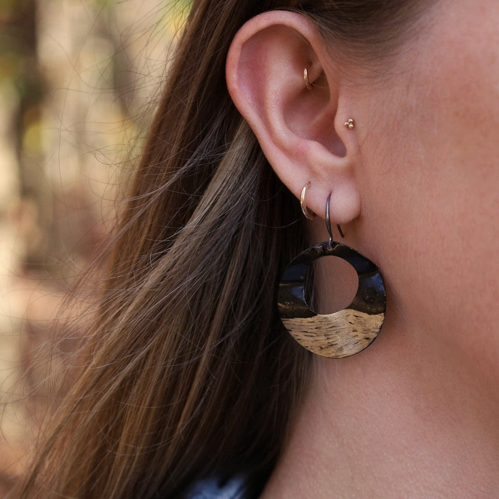 
                      
                        EAR-JM Black and Gold Wavy Hoop Earrings
                      
                    