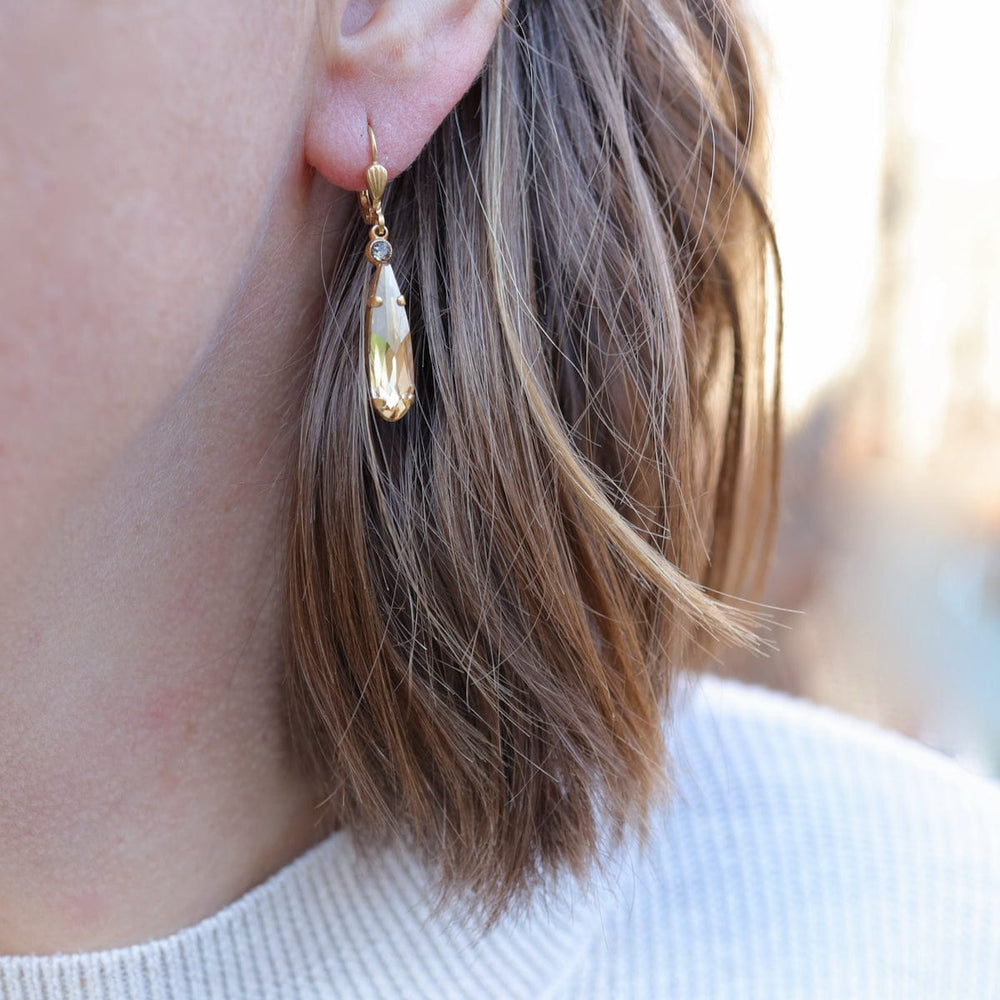 
                      
                        EAR-JM Champagne Fluid Teardrop Earrings
                      
                    