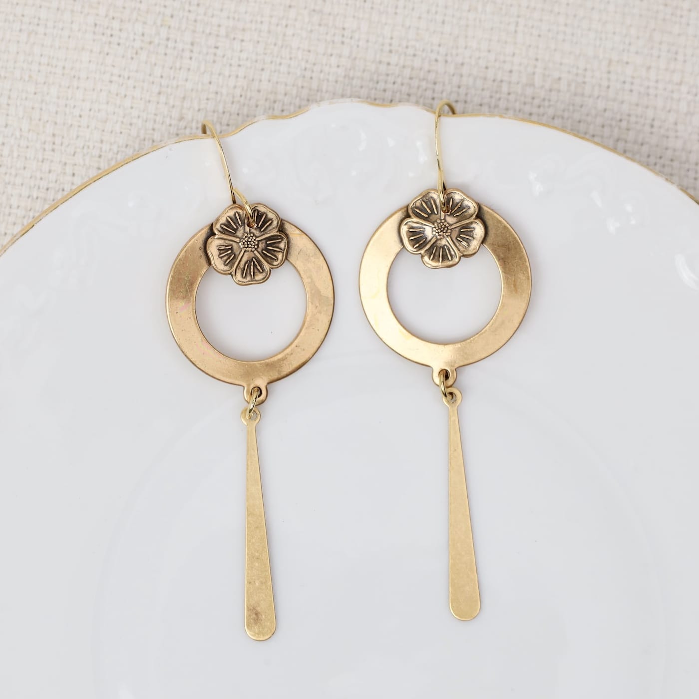 EAR-JM Gold flower on hoop earrings