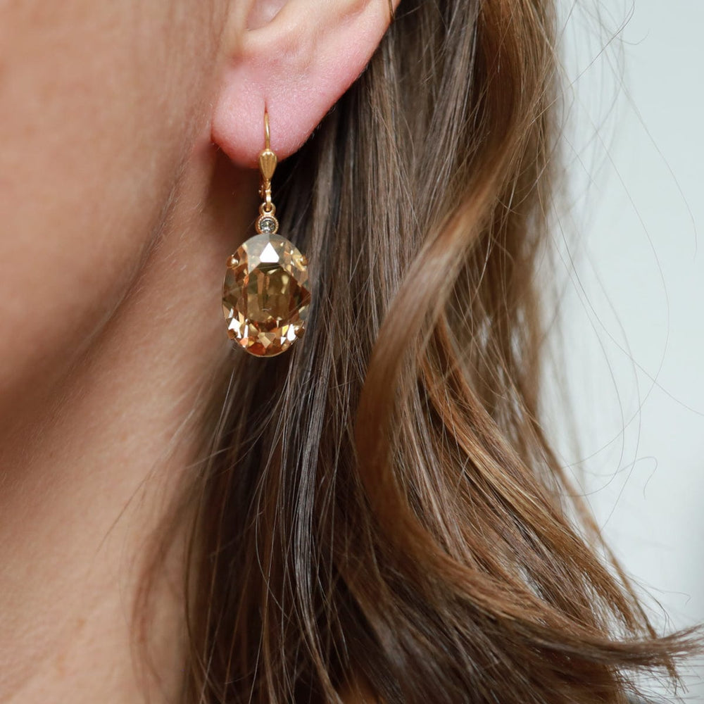 
                      
                        EAR-JM Gold Oval Crystal Earring - Champagne
                      
                    