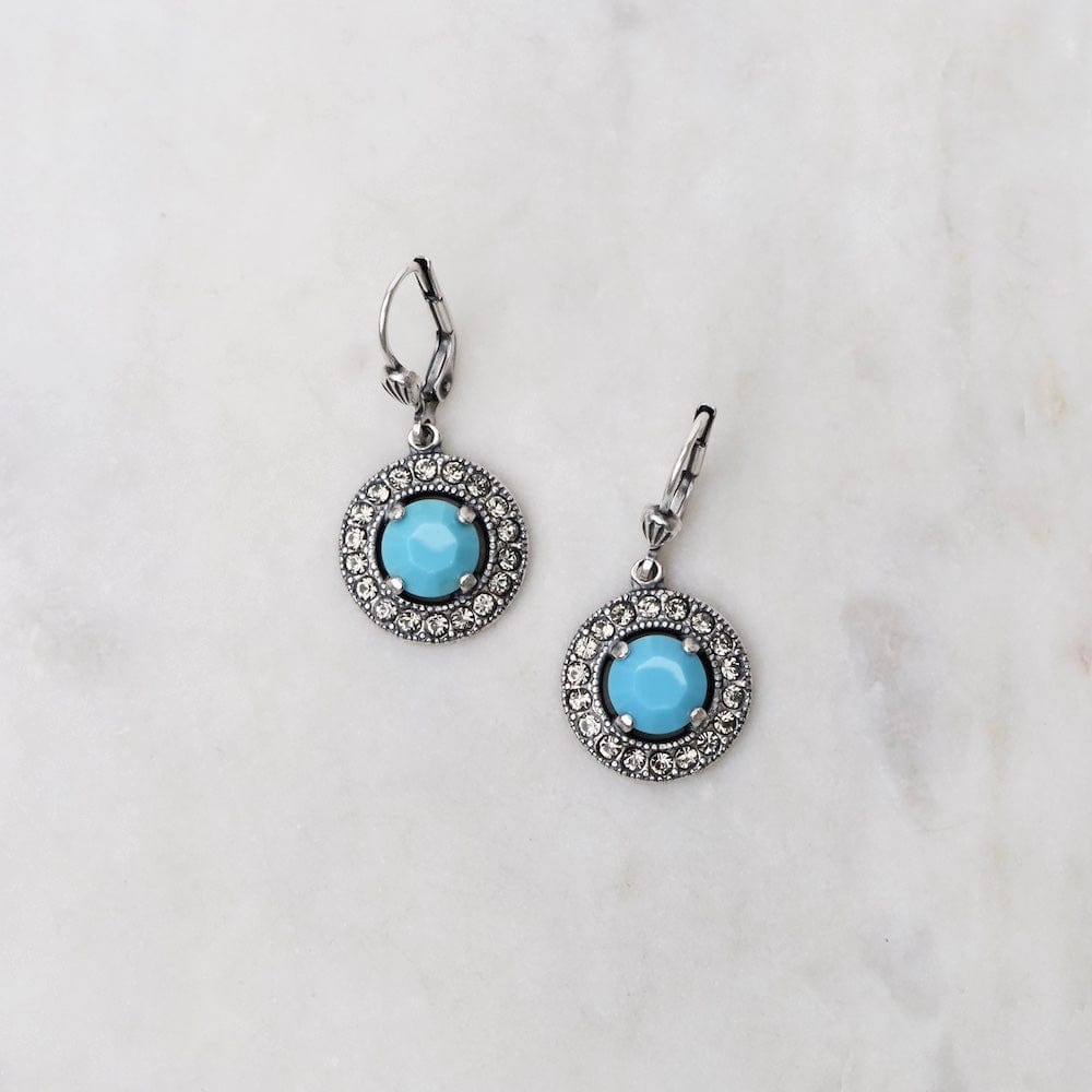 
                      
                        EAR-JM Prong Set Turquoise Crystal Surrounded by a Halo o
                      
                    