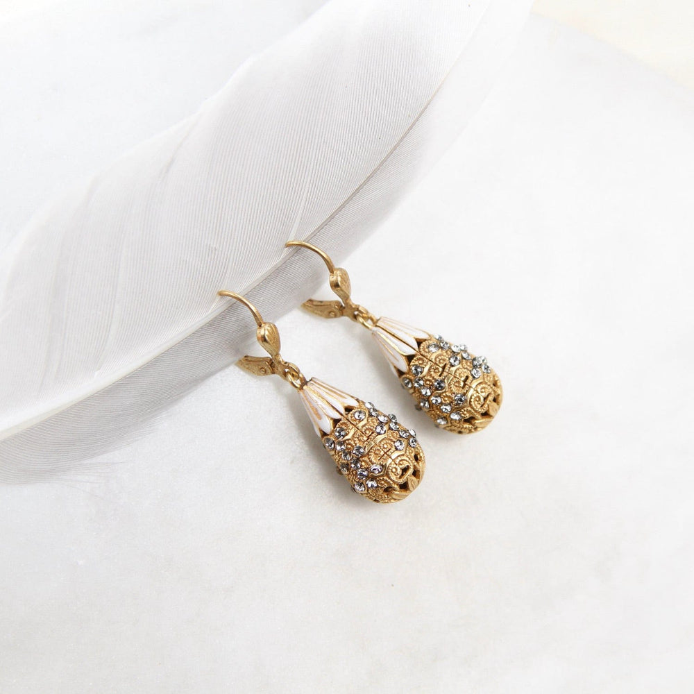 
                      
                        EAR-JM White Enamel Crystal Encrusted Teardrop Earring
                      
                    