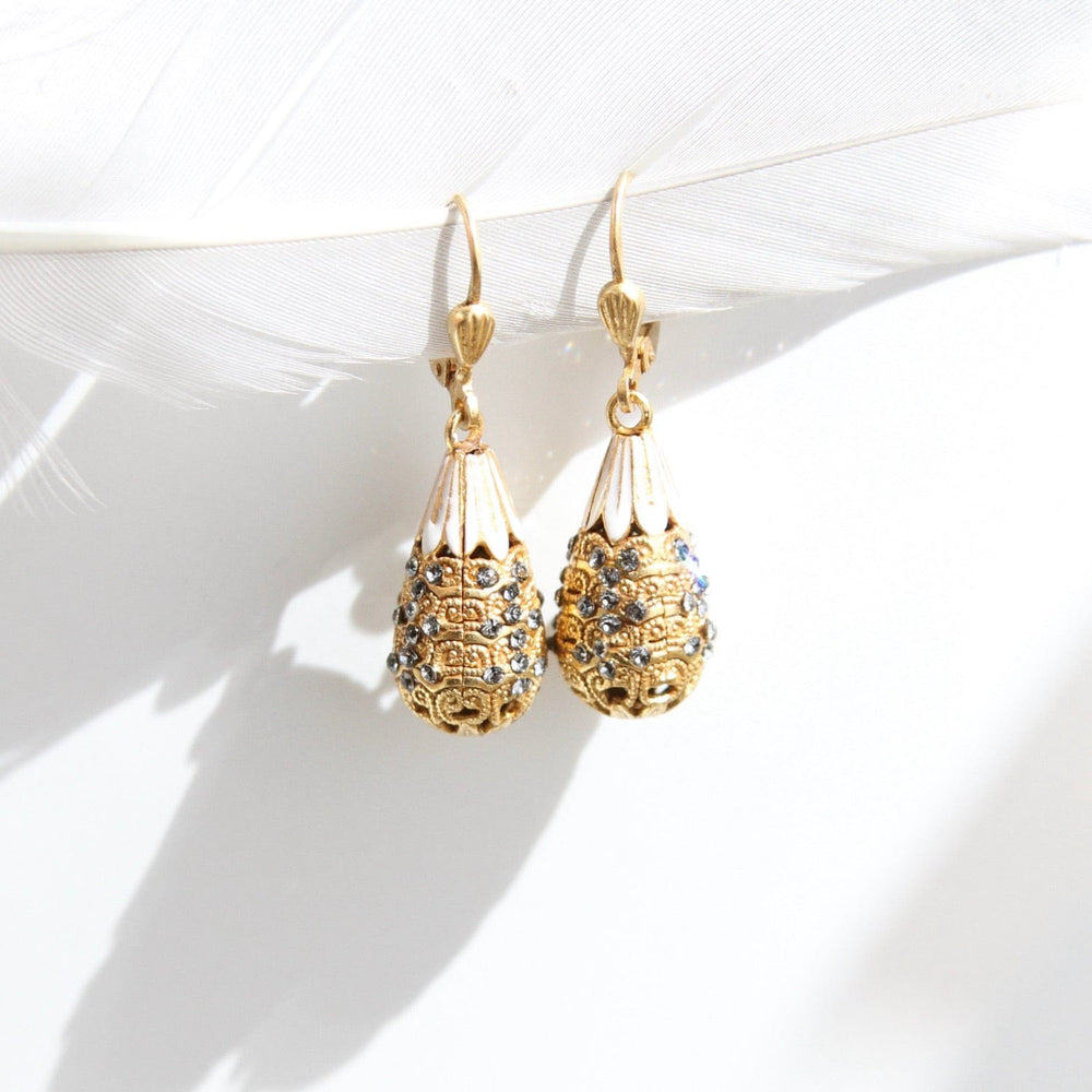 
                      
                        EAR-JM White Enamel Crystal Encrusted Teardrop Earring
                      
                    