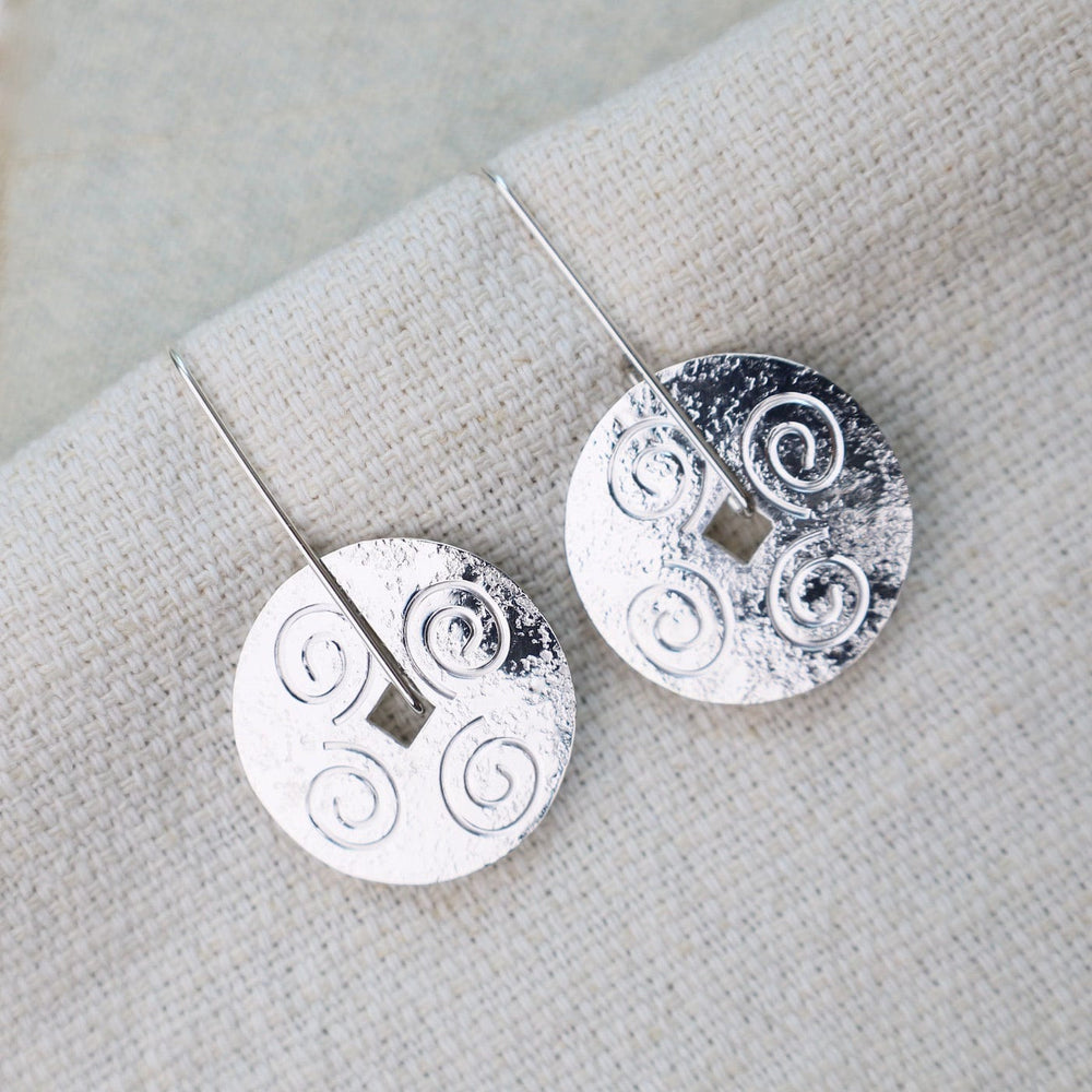 
                      
                        EAR Large Disc with Swirls Long Earrings
                      
                    