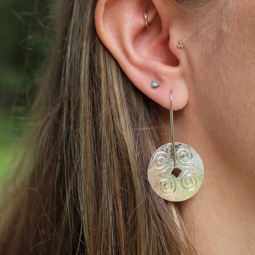 
                      
                        EAR Large Disc with Swirls Long Earrings
                      
                    