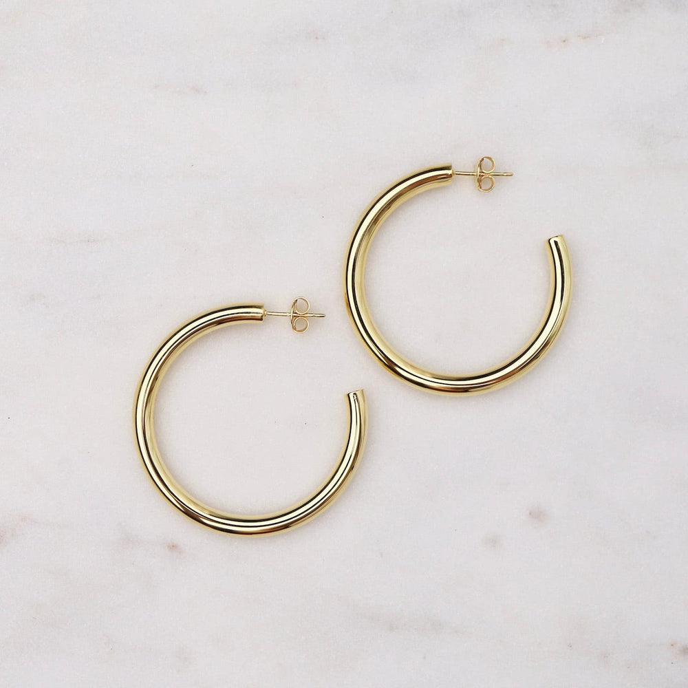 
                      
                        EAR Large Fat Tube Hoops on Posts - Gold Vermeil
                      
                    