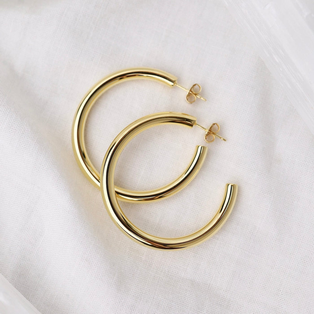 
                      
                        EAR Large Fat Tube Hoops on Posts - Gold Vermeil
                      
                    