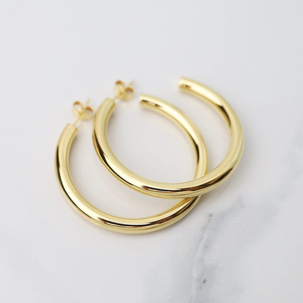 
                      
                        EAR Large Fat Tube Hoops on Posts - Gold Vermeil
                      
                    