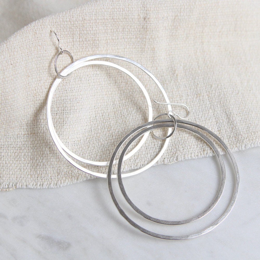 
                  
                    EAR Large Flat Silver Hoops
                  
                