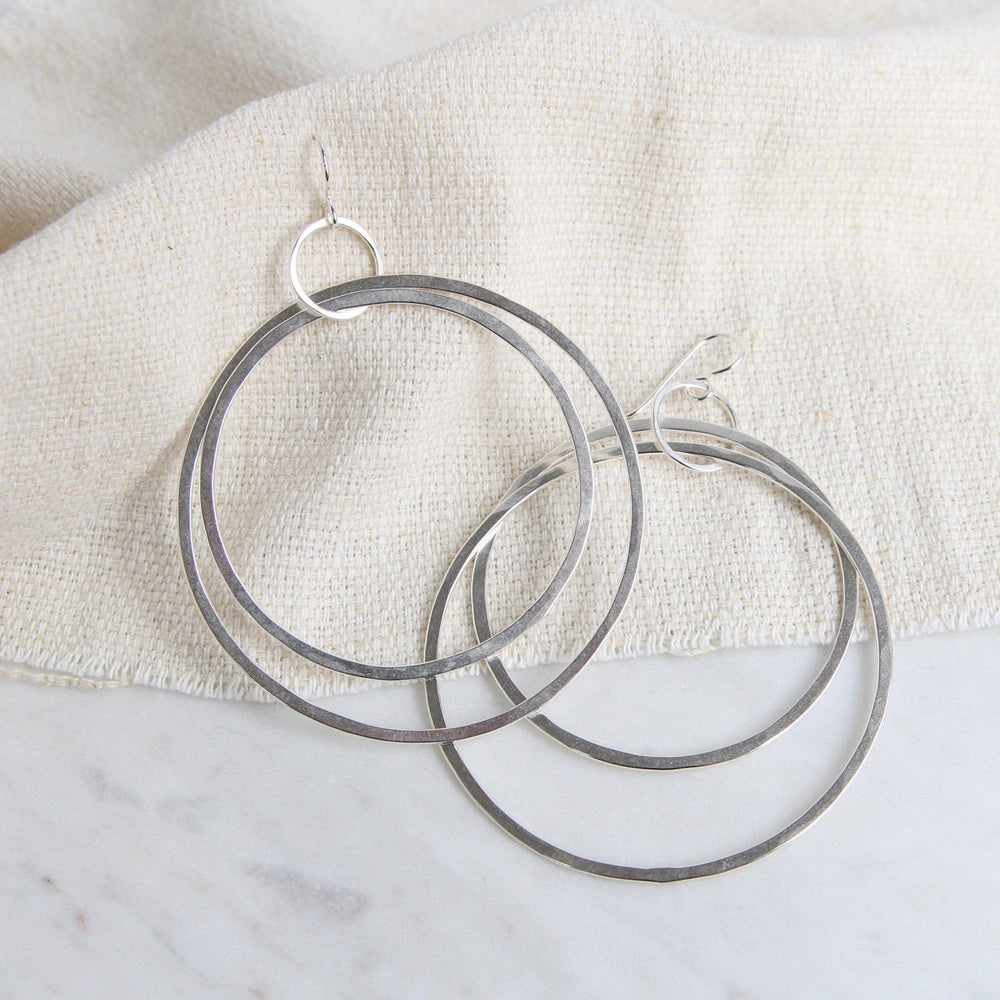 
                  
                    EAR Large Flat Silver Hoops
                  
                