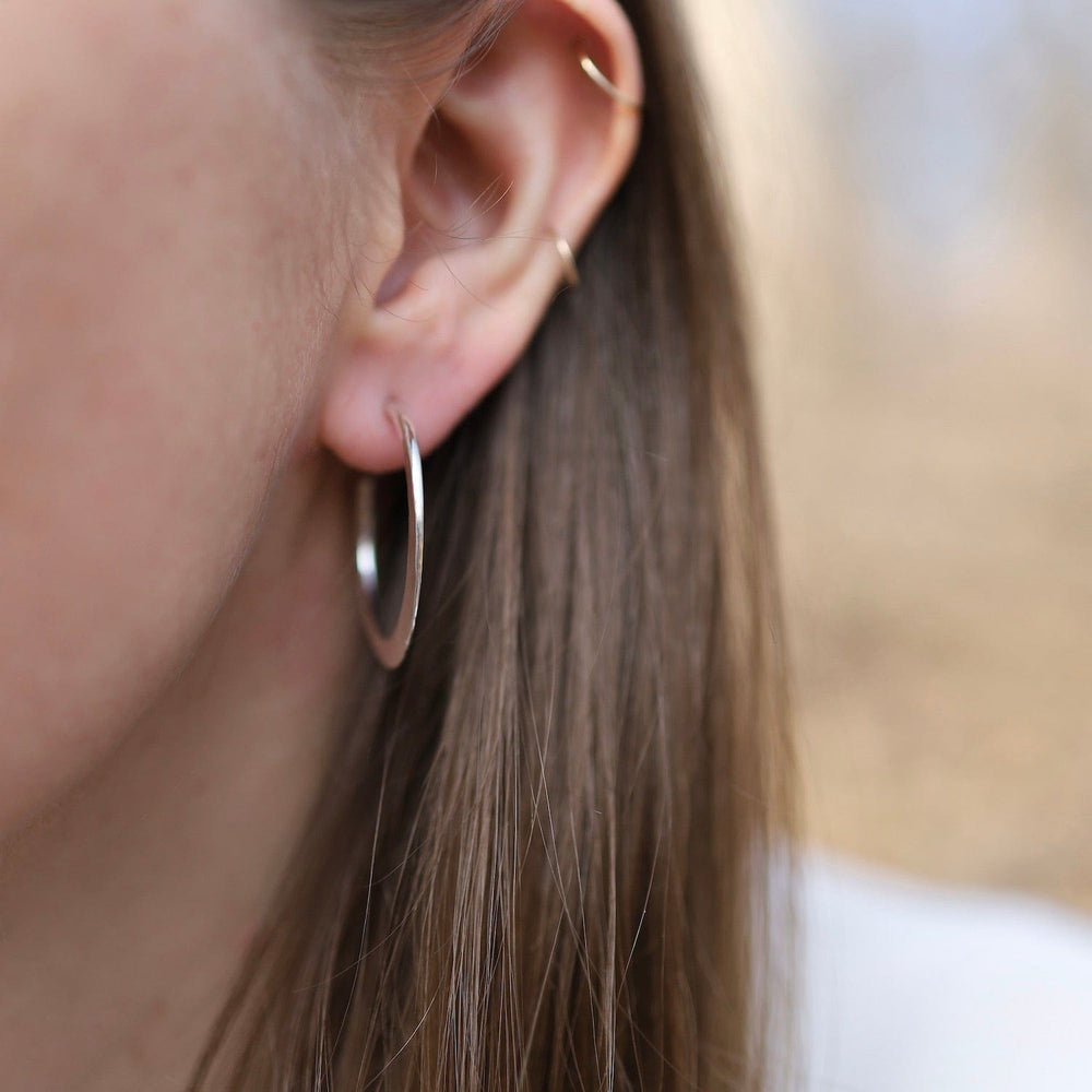 
                      
                        EAR Large Hammered Hoop Earring
                      
                    