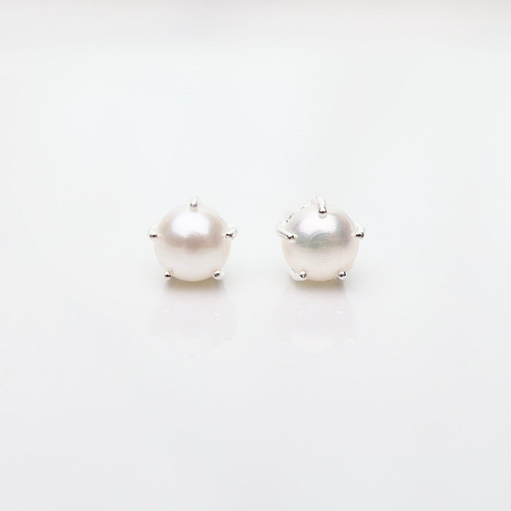 
                      
                        EAR Large Prong-Set Freshwater White Pearl Studs
                      
                    