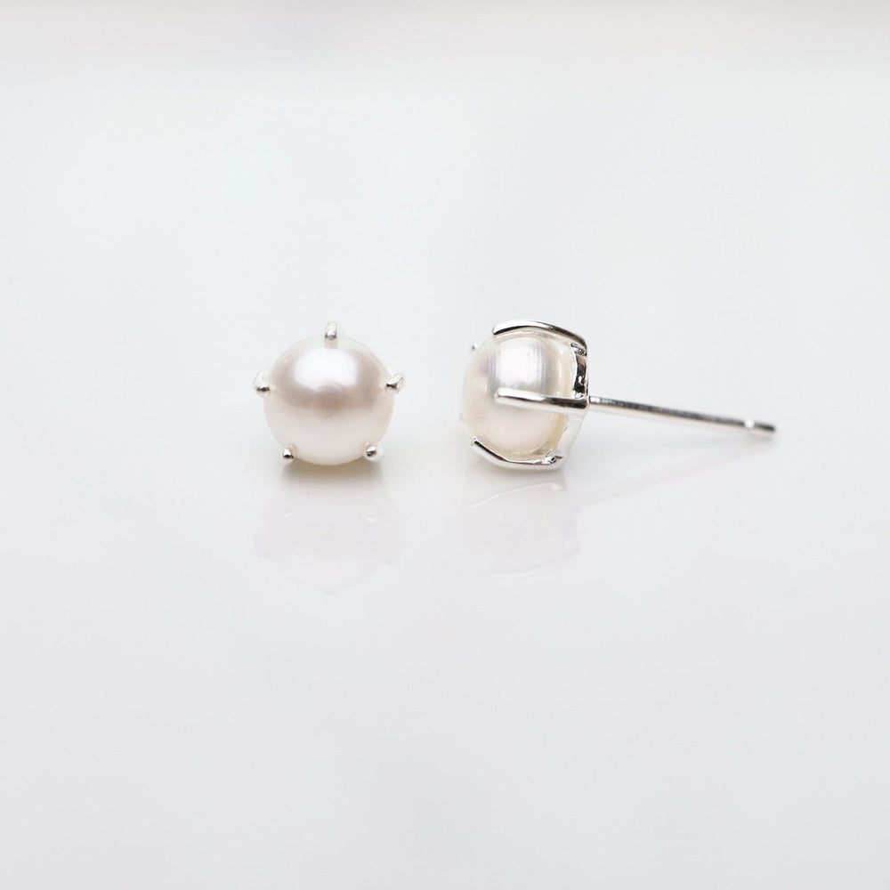 
                      
                        EAR Large Prong-Set Freshwater White Pearl Studs
                      
                    