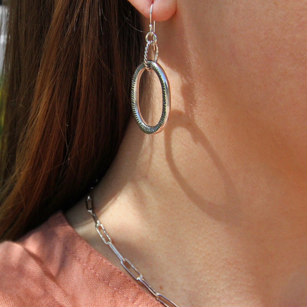 
                      
                        EAR Large Textured Oval Hoops
                      
                    