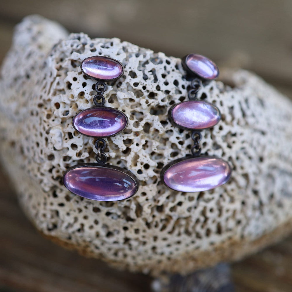 
                      
                        EAR Large Triple Oval Cabochon Amethyst Stud Earring
                      
                    