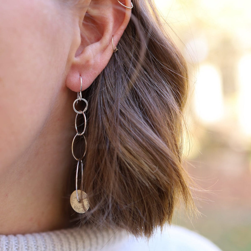 
                      
                        EAR Linky Hoop With Brass Disc Earring
                      
                    