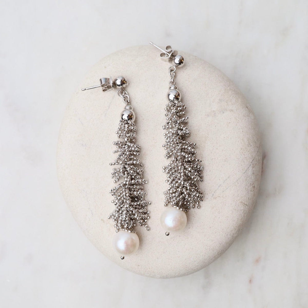 
                      
                        EAR Long Graduated Fuzzy Drop Earrings with Pearl
                      
                    