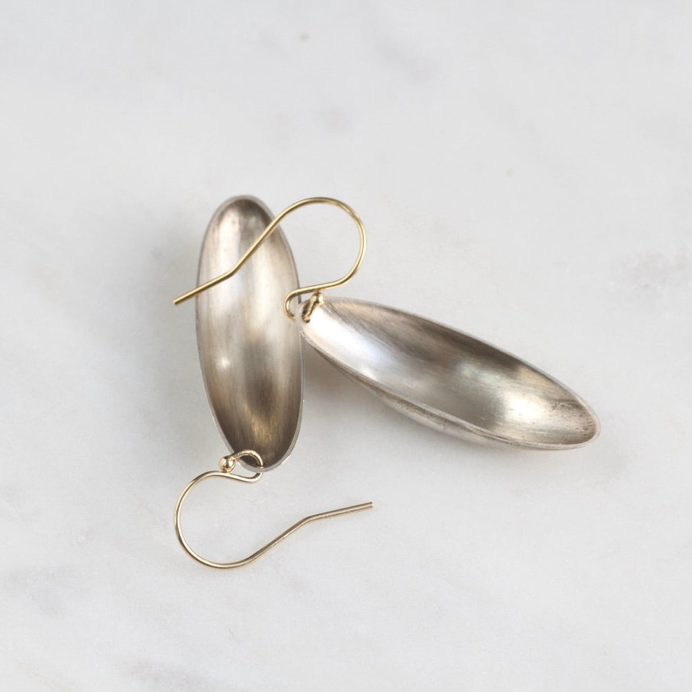 
                      
                        EAR Long Oval Silver Cup Earrings
                      
                    