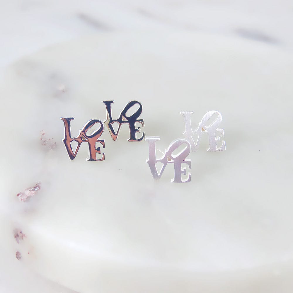 
                  
                    EAR Matte Silver LOVE Sculpture Stud Earrings
                  
                