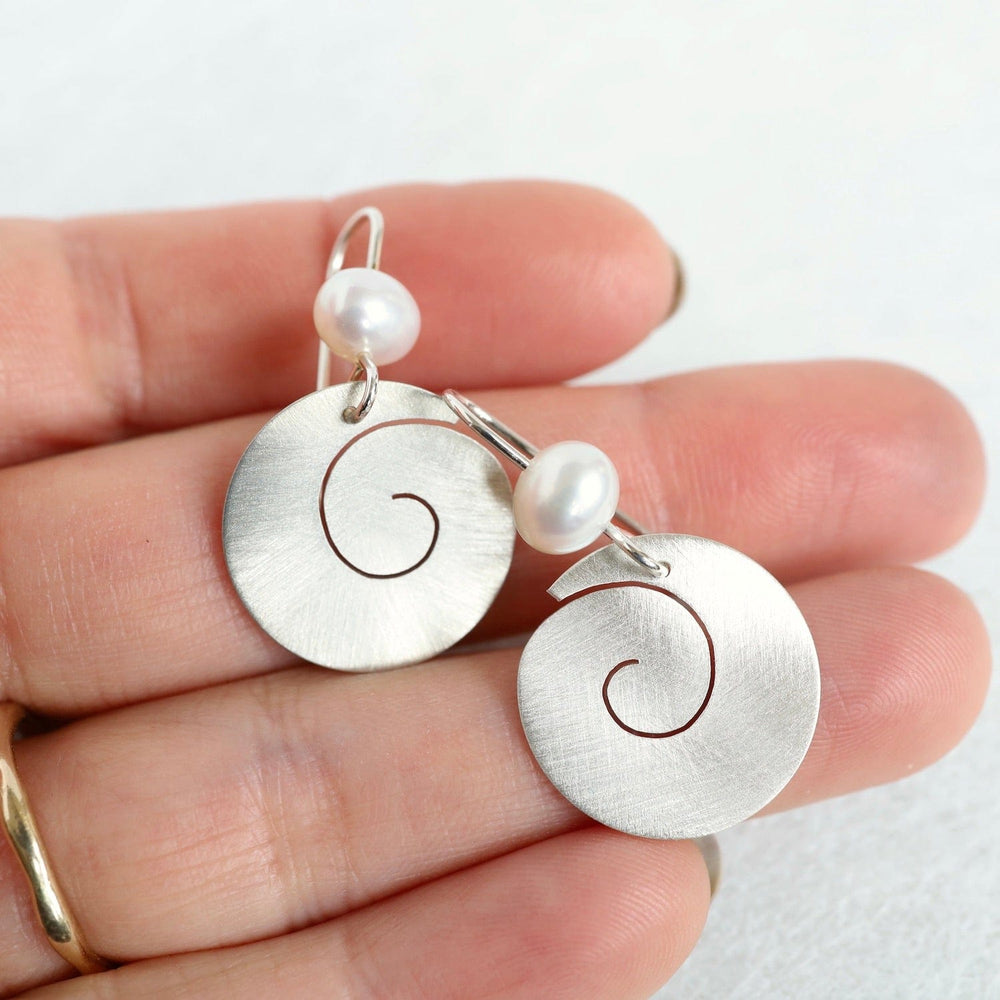 
                      
                        EAR Matte Silver Swirl Drop with White Pearl Earring
                      
                    