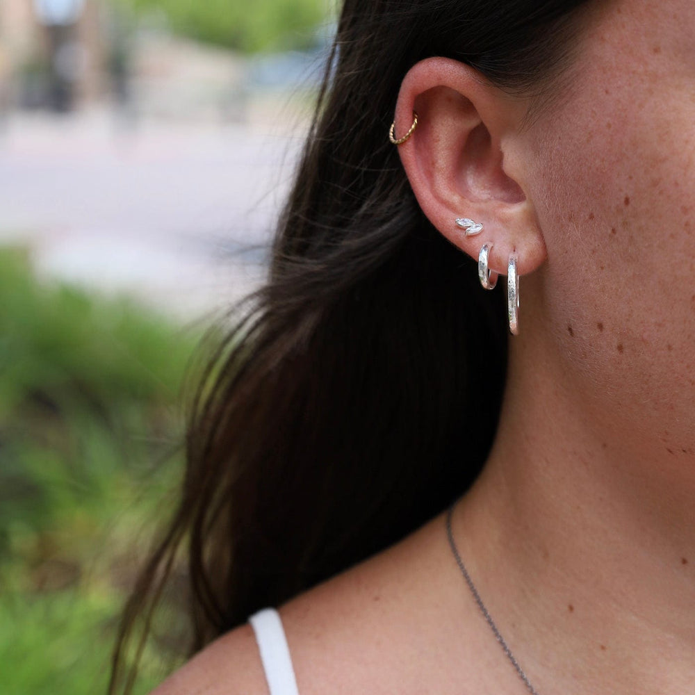 
                  
                    EAR Medium Finely Hammered Hoops in Sterling Silver
                  
                