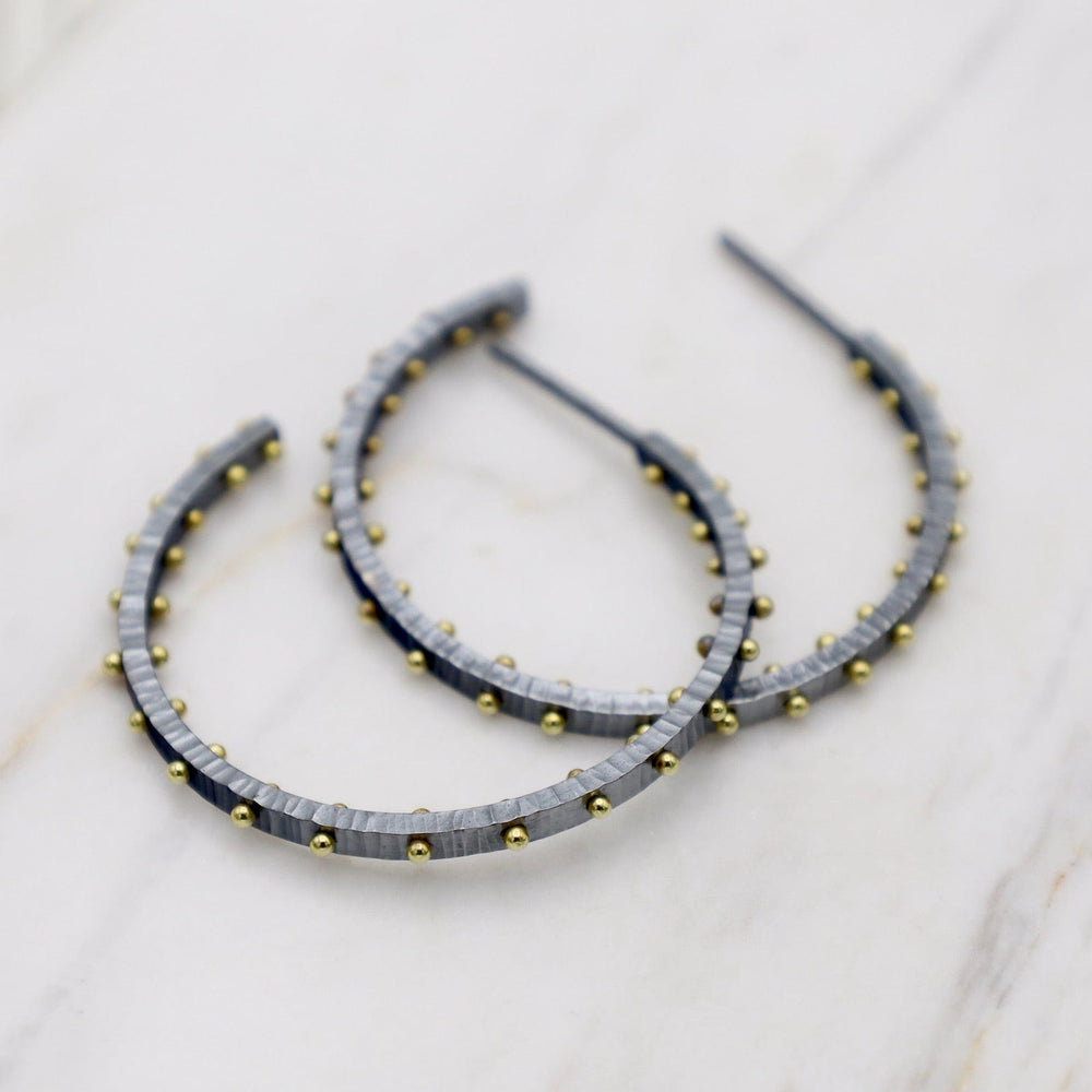 
                  
                    EAR Medium Textured Dot Hoops in Oxidized Silver with 18k Gold
                  
                