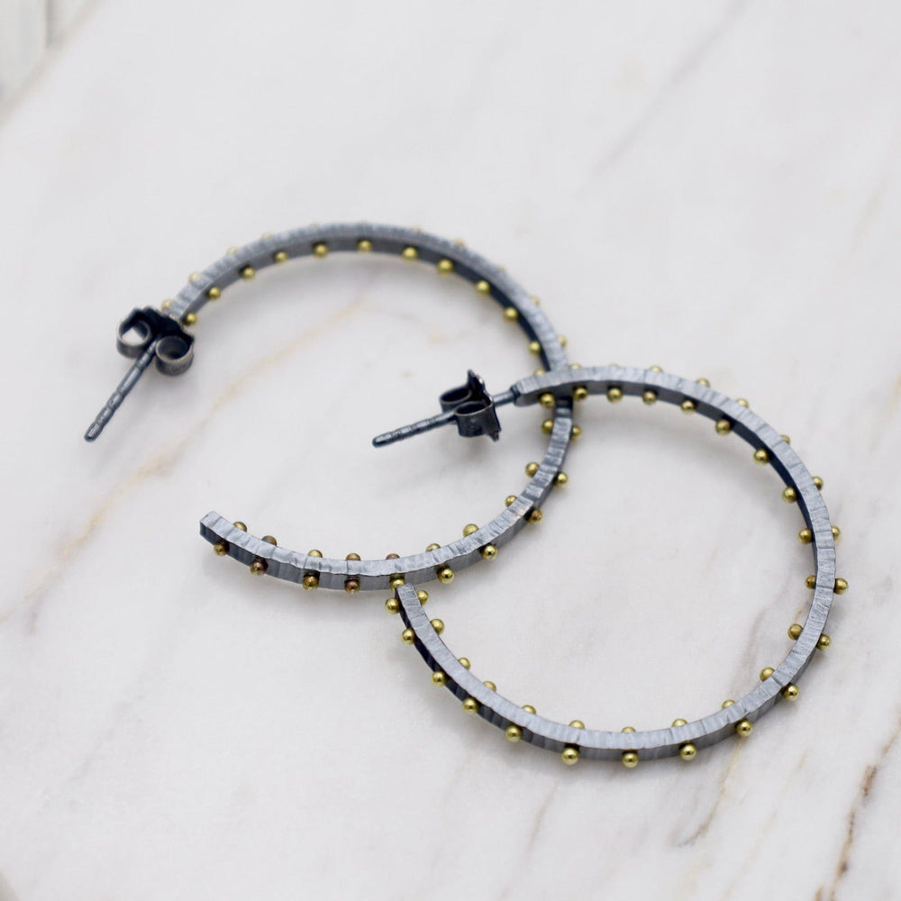 
                  
                    EAR Medium Textured Dot Hoops in Oxidized Silver with 18k Gold
                  
                