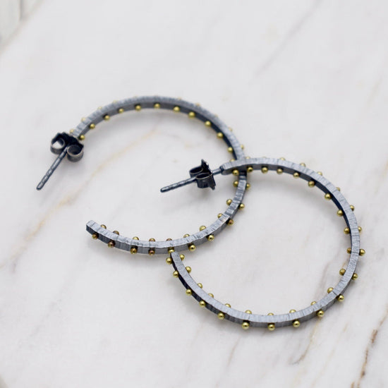 Load image into Gallery viewer, EAR Medium Textured Dot Hoops in Oxidized Silver with 18k Gold
