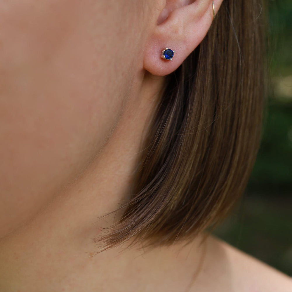 
                      
                        EAR Mini Synthetic Sapphire Post Earring
                      
                    