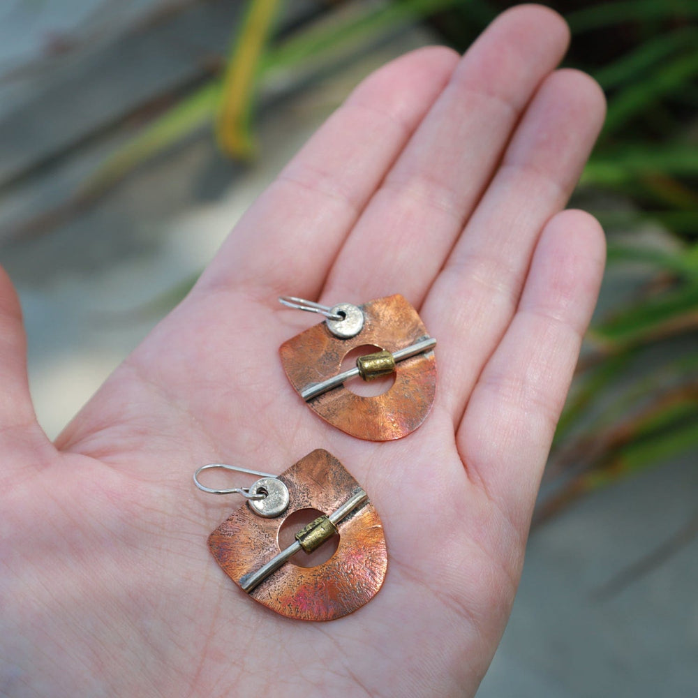 
                      
                        EAR Mixed Metal Shield earring
                      
                    