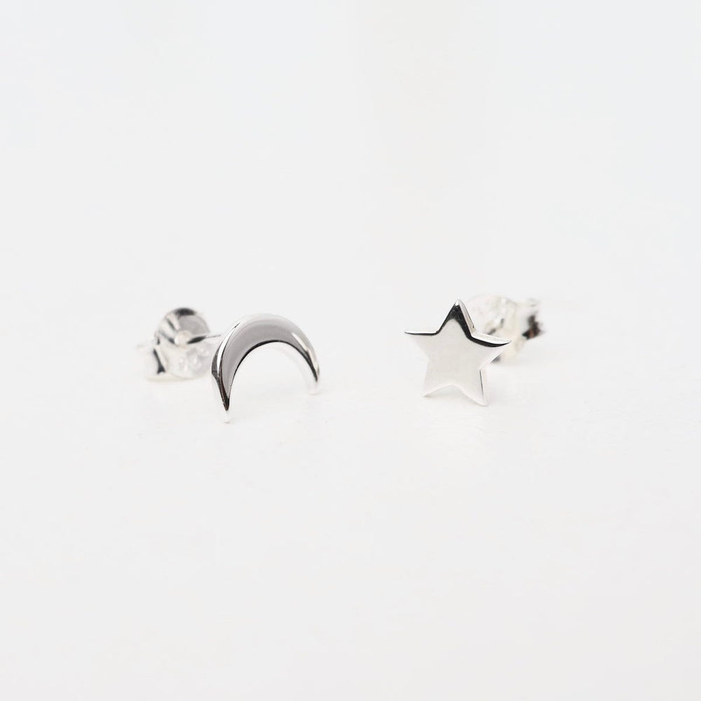 
                  
                    EAR Moon & Star Stud Earrings in Polished Sterling Silver
                  
                