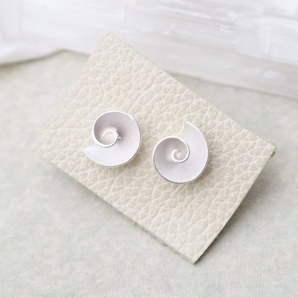 
                  
                    EAR Nautilus Stud Earrings
                  
                