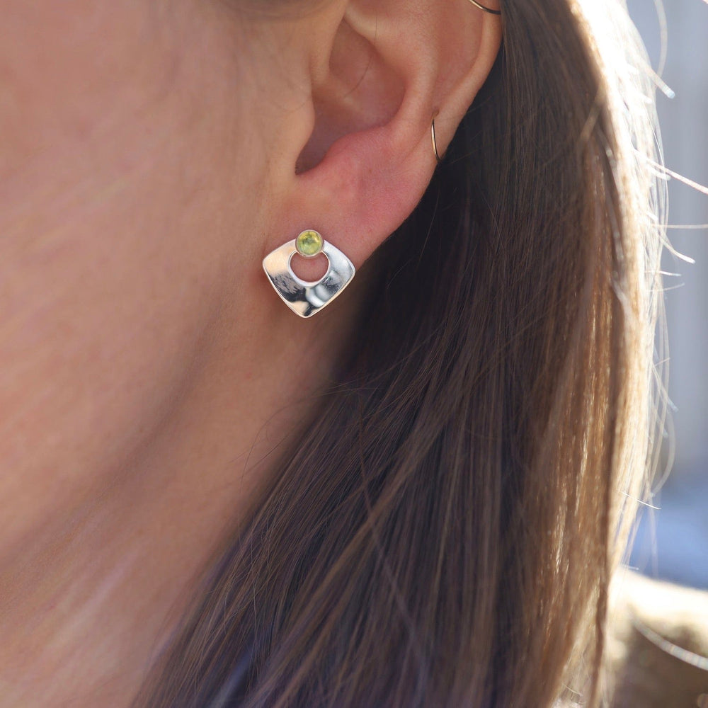 
                      
                        EAR Open Triangle Post with Peridot Cabochon Earring
                      
                    