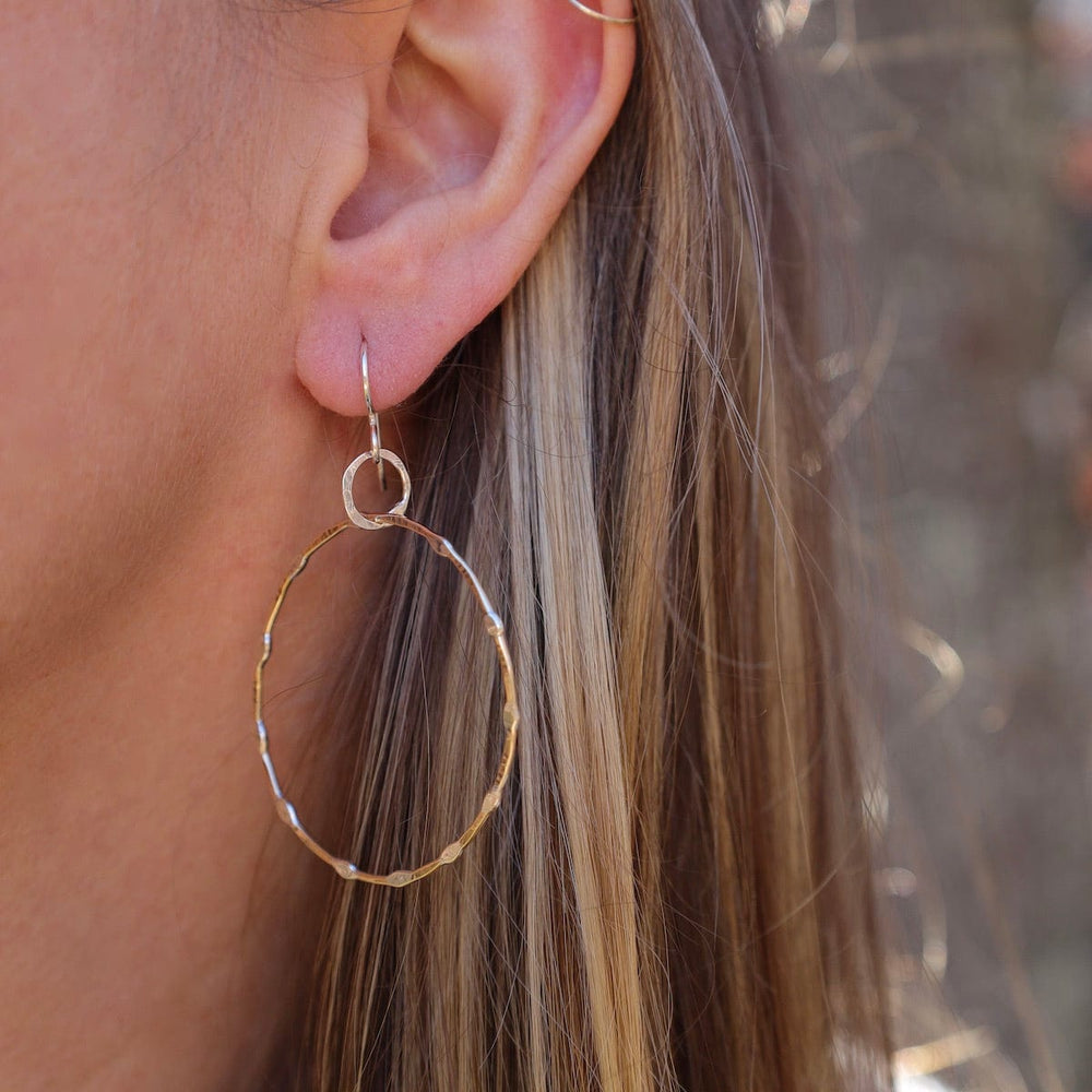 
                      
                        EAR Organicly Shaped Brass & Sterling Silver Circles Earrings
                      
                    