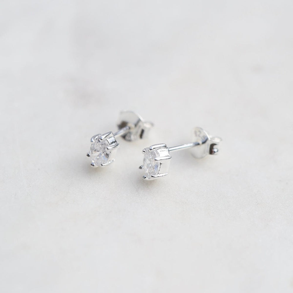 
                  
                    EAR Oval Claw-set CZ Studs - Sterling Silver
                  
                