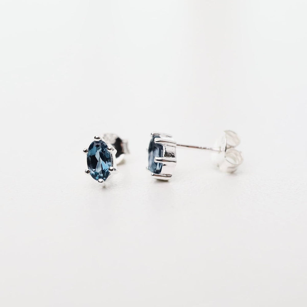 
                  
                    EAR Oval Claw-set London Blue Topaz Studs
                  
                