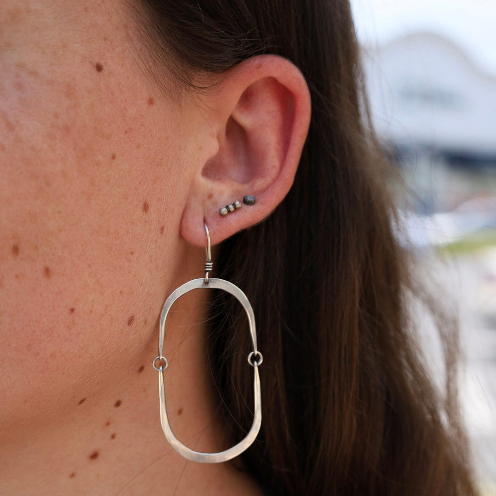 
                      
                        EAR Oval Swing Hoops
                      
                    